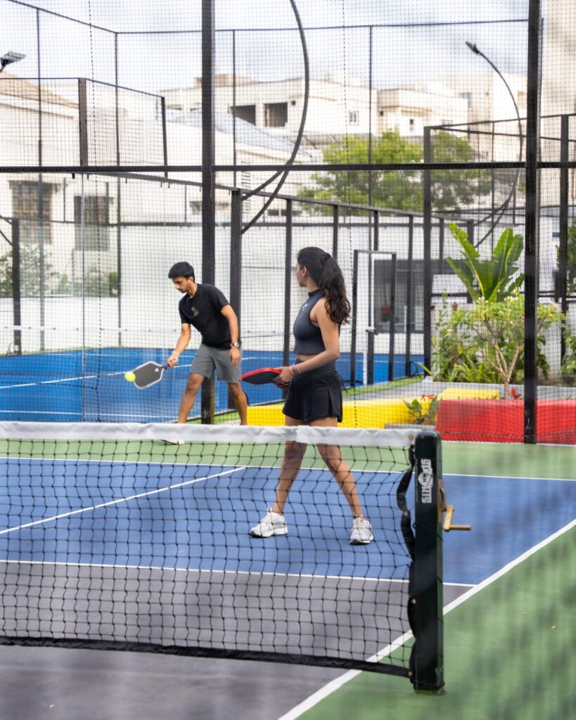 Players enjoying a pickleball rally