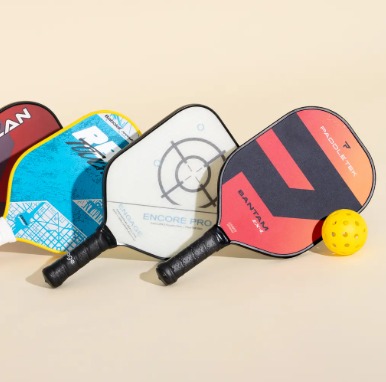 Collection of colorful pickleball paddles